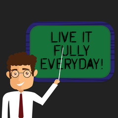 Writing note showing Live It Fully Everyday. Business photo showcasing Be optimistic enjoy life Happiness Successful Man Standing Holding Stick Pointing to Wall Mounted Blank Color Board