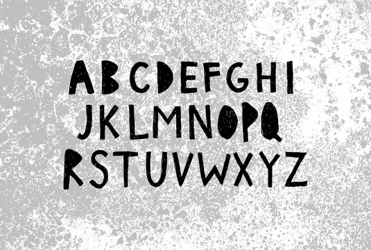 Hand Drawing Alphabet on the grunge background. Grunge black texture