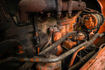 Oily engine of an old russian made tractor