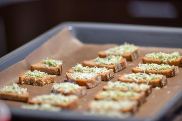 black bread croutons, cheese with spices. toast on the stove