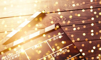 Movie clapper board on wooden background
