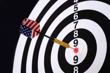 Center target of darts isolated on a black background