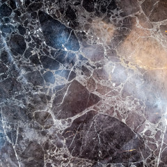 Background texture of stone countertops. texture is under the stone and black marble.