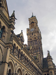 Fototapeta na wymiar a view of bradford town hall in west yorkshire showing ornate gothic architecture and clock tower