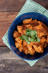 indian butter chicken dish with cilantro on top