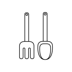 shovel and rake to play on the beach on white background