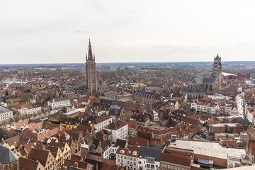 Fototapeta na wymiar Bruges, Belgium - APRIL 05, 2019: View from above the Belfry tower in Bruges. Panoramic view