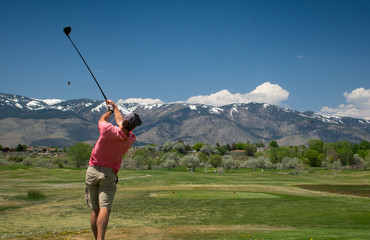 Golfing in the mountains of Lake Tahoe - Golfer Hitting His Drive Shot