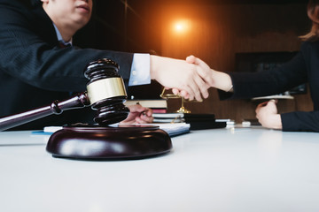 smart lawyer handshake with advice in the office before considering the judgment, lawyer concept.