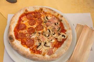 Delicious Pizza Isolated on a white plate