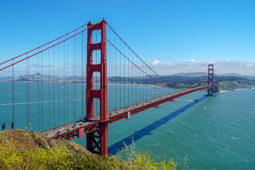 Famous Golden Gate Bridge. Suspension bridge spanning the Golden Gate. The structure links the American city of San Francisco, California, the northern tip of the San Francisco Peninsula to Marin C