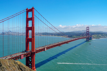 Famous Golden Gate Bridge. Suspension bridge spanning the Golden Gate. The structure links the American city of San Francisco, California, the northern tip of the San Francisco Peninsula to Marin C