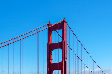 Famous Golden Gate Bridge. Suspension bridge spanning the Golden Gate. The structure links the American city of San Francisco, California – the northern tip of the San Francisco Peninsula – to Marin C