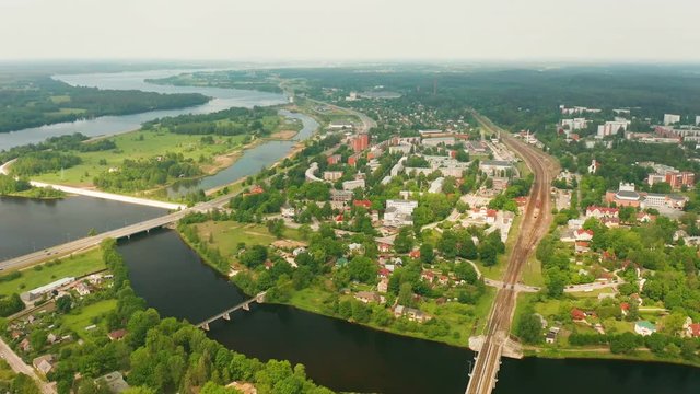Aerial view of a green small town of Ogre in Latvia. 4k video.