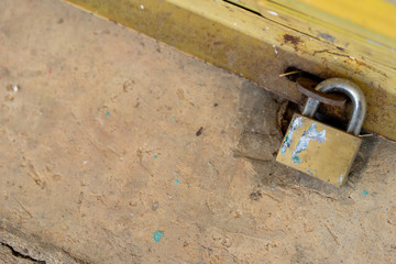 The steel door is locked with a tight lock to prevent robbers and outsiders.