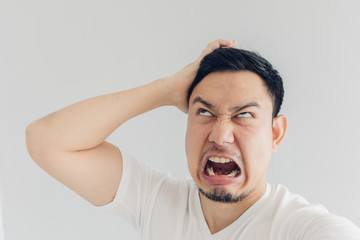 Close up face of angry man selfie himself.