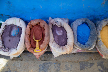 Multi colored dyes available in the street markets in Chefchaouen, Morocco