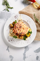 Grilled Pork with Potato, Spices and Pita Bread