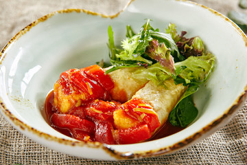 Fried Cheese, Sweet Pepper, Green Leaves of Lettuce and Arugula in Tomato Sauce