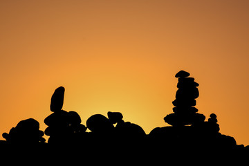Stack of stones on the sea beach
