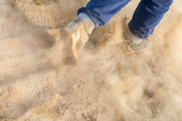 Feets in a dust