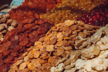 Dry fruits close up photo on market. Almond, Fennel, Apricot, Arrowroot, Cantaloupe. Background texture.