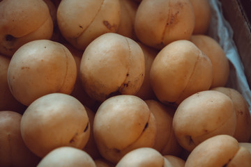 Fruits close up photo on market. Background texture. 