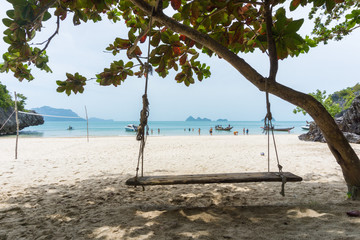 A Wood Swing Overlooking a Beach on the Gulf of Thailand