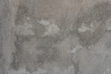 Texture, wall, concrete, it can be used as a background. Wall fragment with scratches and cracks