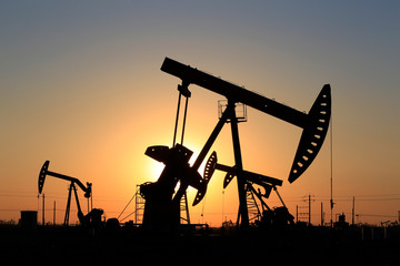 The pumping unit is working in the setting sun