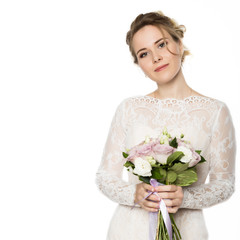 Beautiful bride with wedding bouquet in her hands. free space for your text