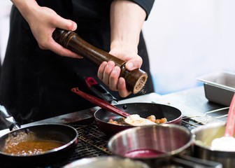 Chef cooking food in the kitchen, Chef preparing food