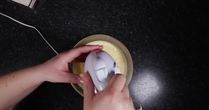 Lady Finishing Mixing The Cake Batter To Make A Portuguese Dessert 4K 30FPS - International, Cooking, Baking