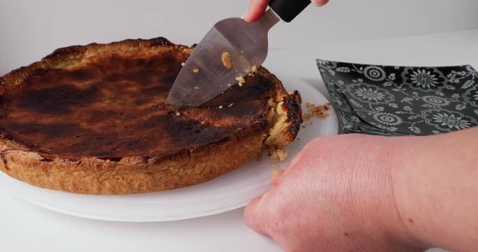 Reverse Time Lapse Of Woman Cutting A Slice Of Delicious Custard Tart 60FPS 4K - Cake Server, White Plate, White Background, Decorated Plate, CloseUp