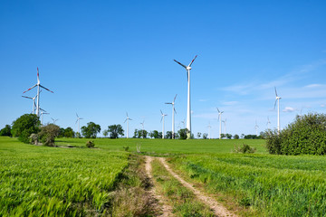 Wind turbines in an agricultural area seen in Germany