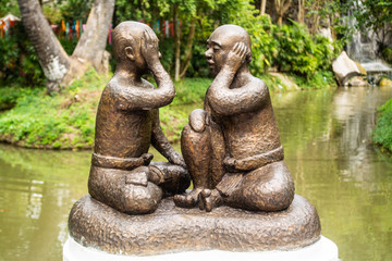 Fototapeta na wymiar Statue of a closed ear people should know how to listen or should not listen in Thailand