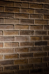 Brick wall with spot light and shadow
