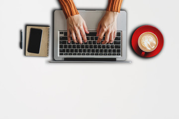 Top view.Business analysis and strategy concept. Businessman analyzing financial data on smartphone and laptop computer.