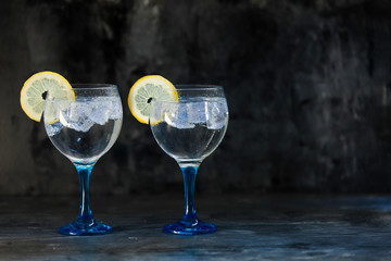 two gin tonics
