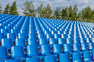 Fototapeta premium rows of empty seats in stadium. soccer football stadium. empty stands of the stadium.