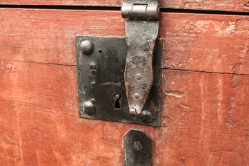 Old wooden retro vintage chest iron latch lock closeup