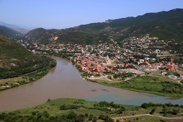Fototapeta premium View from the observation deck of the Jvari Monastery on the city of Mtskheta near the confluence of the Aragvi and Kura rivers.