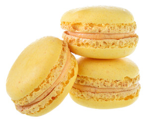 Yellow peach macaroon close up isolated