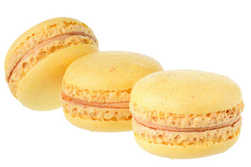 Yellow peach macaroon close up isolated