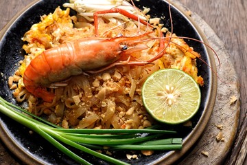 shrimps with lemon and herbs on plate