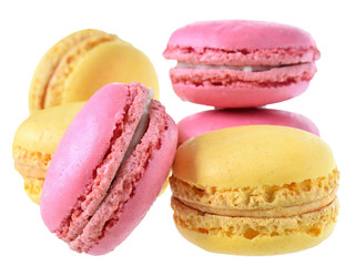 Pink strawberry and peach macarons isolated