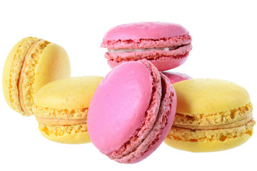 Pink strawberry and peach macarons isolated