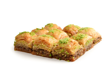 Pistachio baklava on a white background. Dessert.