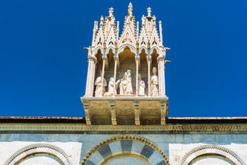 Details of the outer wall of the Camposanto Monumentale Cemetery, Pisa, Italy, crowned by a Gothic...