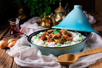 Tajin beef stew with rice paprika and sesame seeds